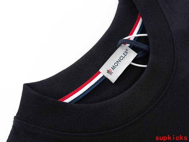 Full styled look of Moncler luxury clothing with monogram-inspired silhouette