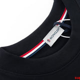 Full styled look of Moncler luxury clothing with monogram-inspired silhouette