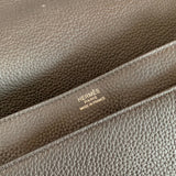 Side view of sleek structured handbag