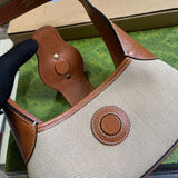 Handle and strap detail of premium structured women's handbag – women's premium purse