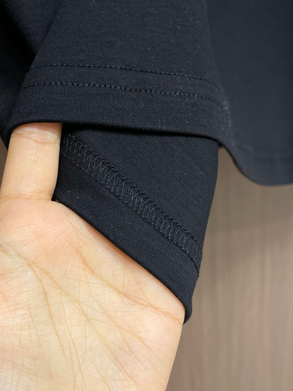 Close-up detail shot of Louis Vuitton luxury clothing with tailored silhouette