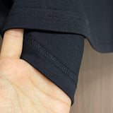 Close-up detail shot of Louis Vuitton luxury clothing with tailored silhouette