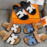 Hermes sandals Style 133 - close-up of iconic logo design
