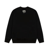 Close-up detail shot of Louis Vuitton luxury clothing with monogram-inspired silhouette