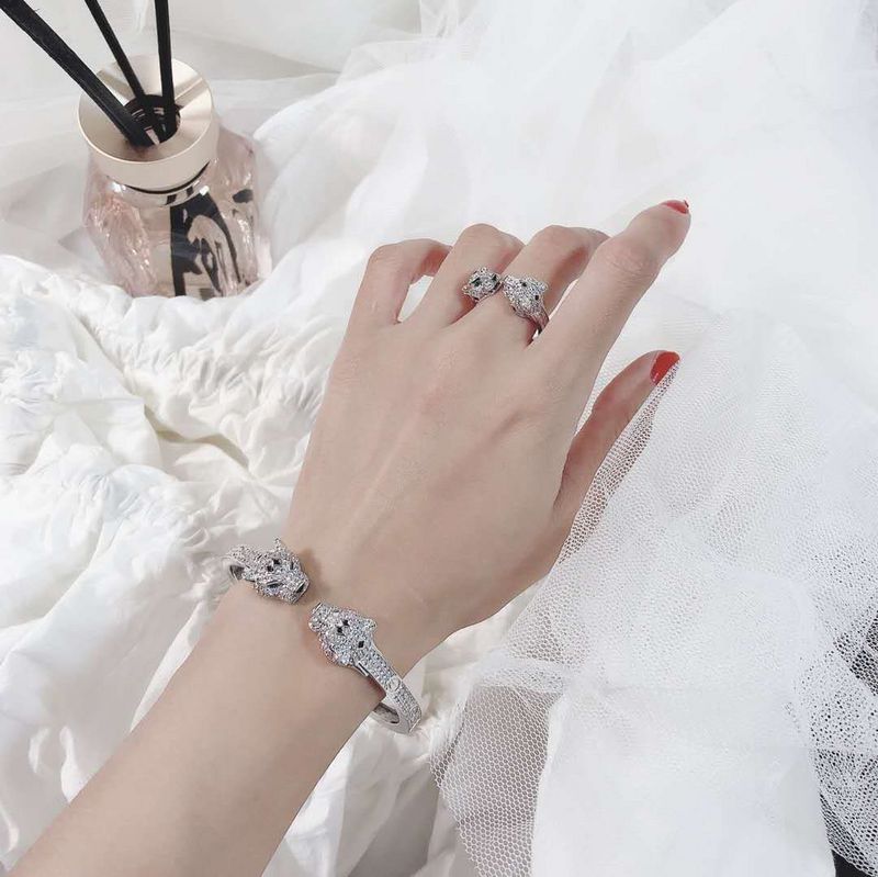 Close-up detail view of Cartier unisex jewelry piece