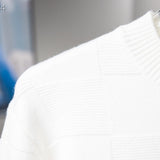 Back view of Louis Vuitton luxury clothing with tailored silhouette