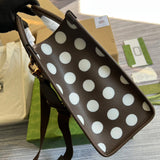 Top view of elevated signature women's handbag – women's statement bag