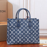  Tailored top-handle bag carried on shoulder
