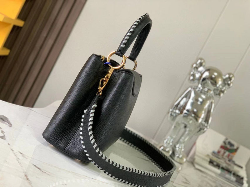 Close-up detail of everyday-luxe signature women's handbag – women's luxury handbag