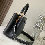 Close-up detail of everyday-luxe signature women's handbag – women's luxury handbag