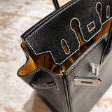 Classic handbag styled for everyday wear
