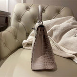 Side view of structured structured handbag