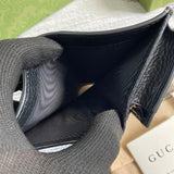 Side profile of statement signature women's handbag – women's designer-style accessory