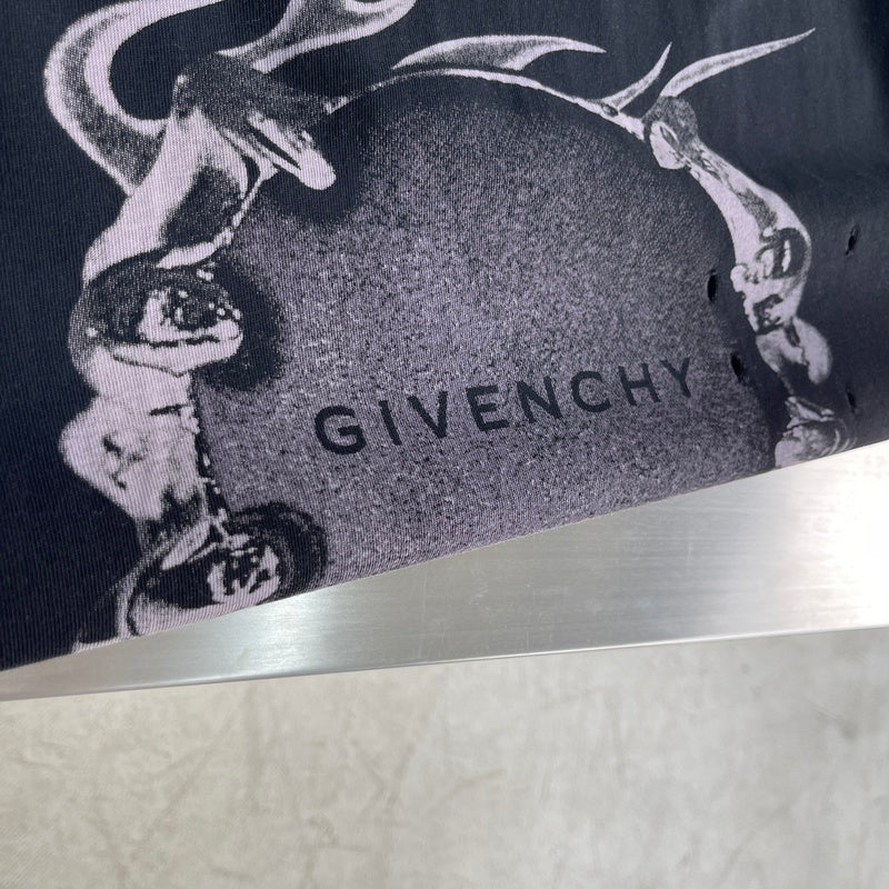 Flat lay presentation of Givenchy luxury clothing with contemporary cut