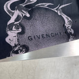 Flat lay presentation of Givenchy luxury clothing with contemporary cut