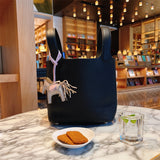 Side view of elegant structured handbag