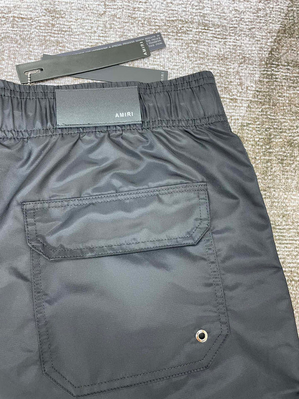 Texture and finish detail of Amiri luxury piece style No.054