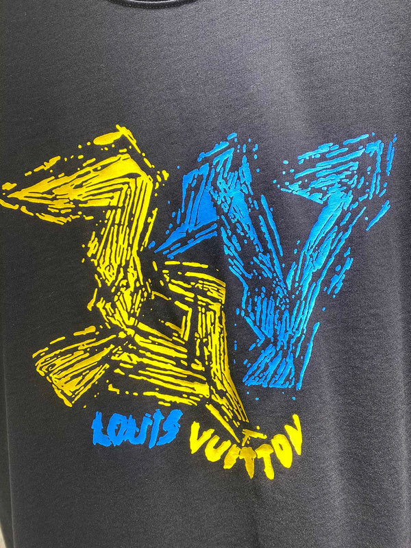 Flat lay presentation of Louis Vuitton cotton t-shirt with runway-inspired design