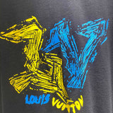 Flat lay presentation of Louis Vuitton cotton t-shirt with runway-inspired design