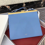 Side profile of premium polished women's handbag – women's designer-style accessory