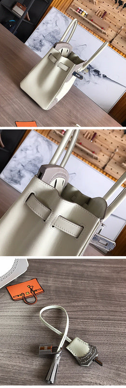 Side view of sculpted structured handbag