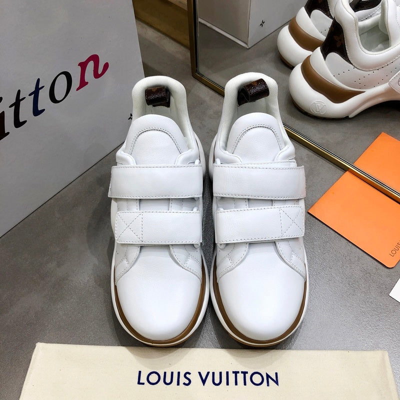 Louis Vuitton Beige Knee-High Boots - Close-Up Texture View