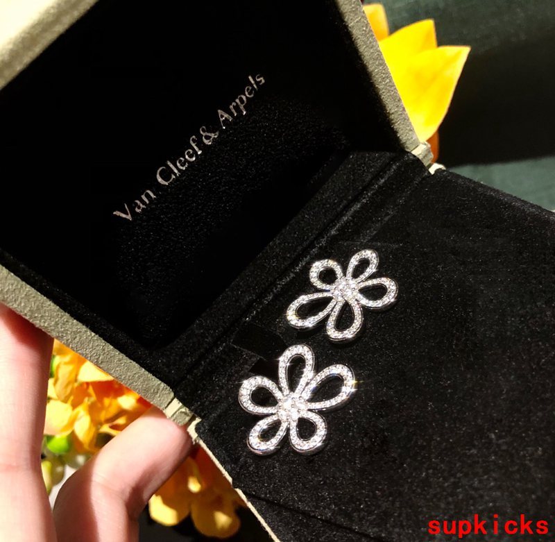 Lifestyle view of Van Cleef & Arpels unisex jewelry piece