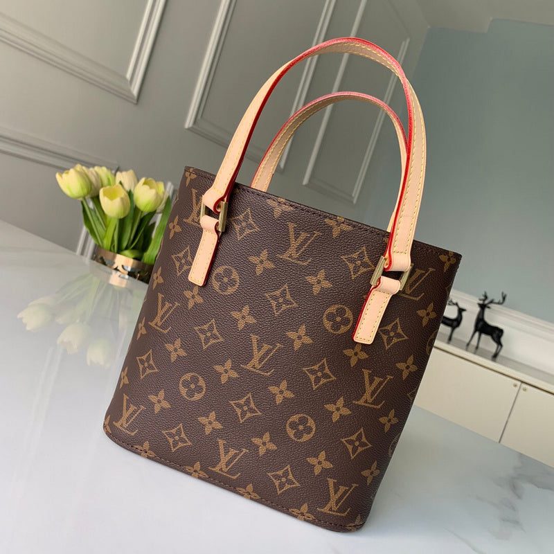 Handle and strap detail of sleek statement women's handbag – women's designer-style accessory
