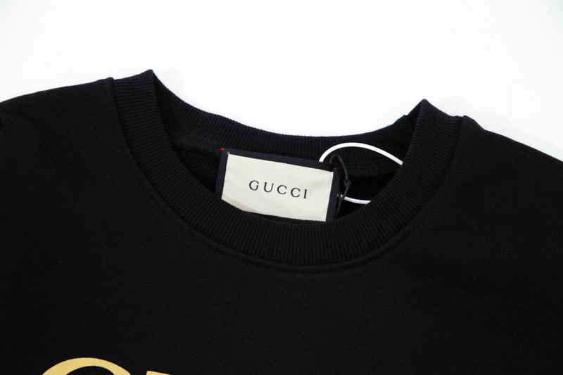 Close-up detail shot of Gucci luxury clothing with relaxed-fit cut
