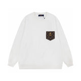 Side profile of Louis Vuitton luxury clothing with label-forward styling