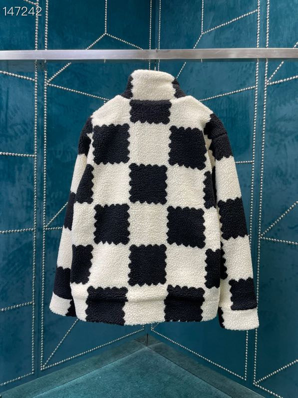 Back view of Louis Vuitton luxury clothing with signature branding