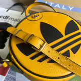 Close-up detail of signature elevated women's handbag – women's designer-style accessory