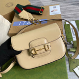 Handle and strap detail of structured refined women's handbag – women's statement bag