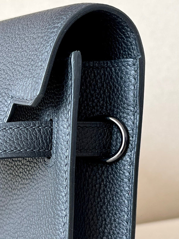 Side view of poised structured handbag