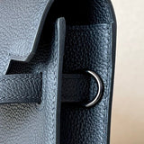 Side view of poised structured handbag