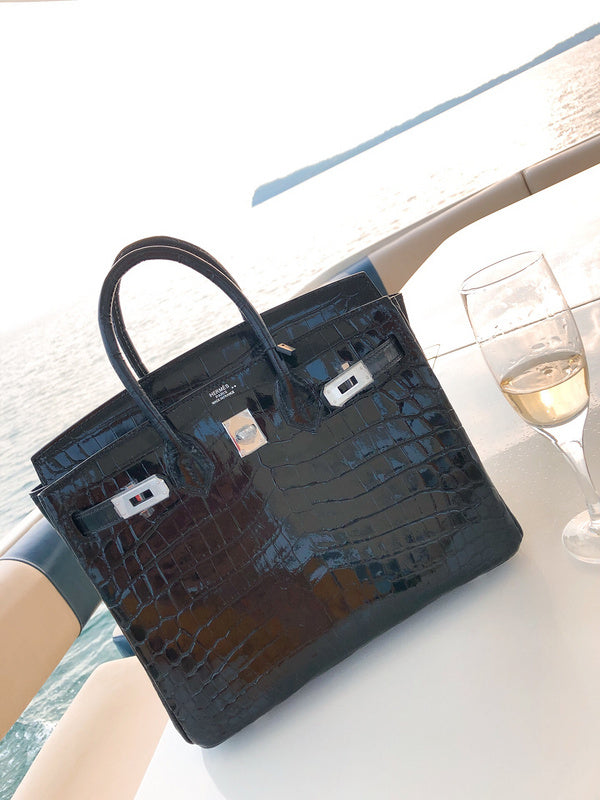 Side view of understated structured handbag