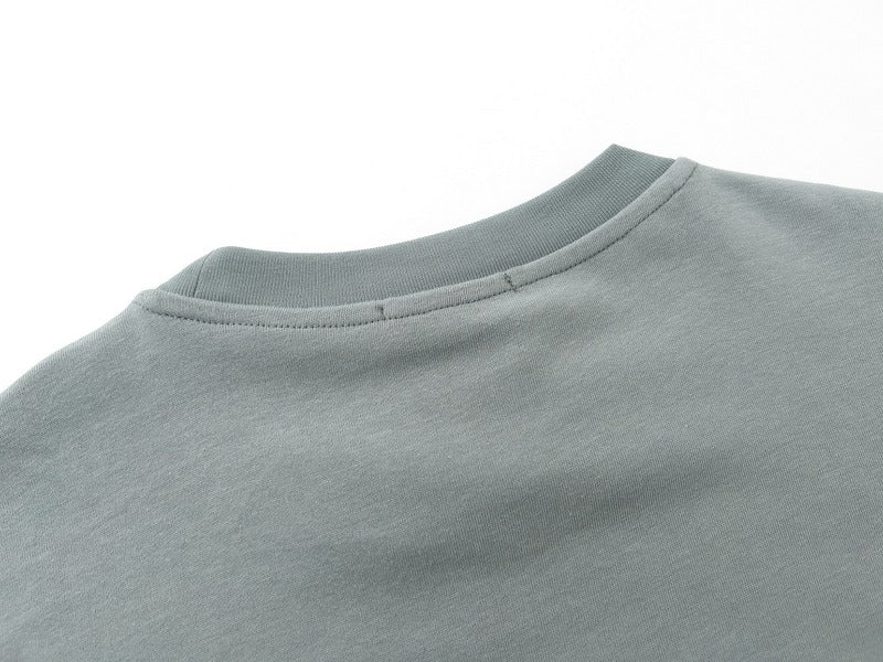 Side profile of Polo cotton polo shirt with monogram-inspired silhouette