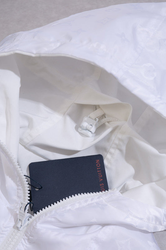 Back view of Louis Vuitton luxury clothing with label-forward styling