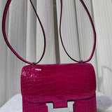 Side view of streamlined structured handbag