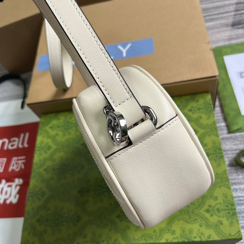 Front view of polished signature women's handbag – women's luxury accessory