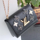 Styled lifestyle shot of everyday-luxe refined women's handbag – women's designer-style accessory