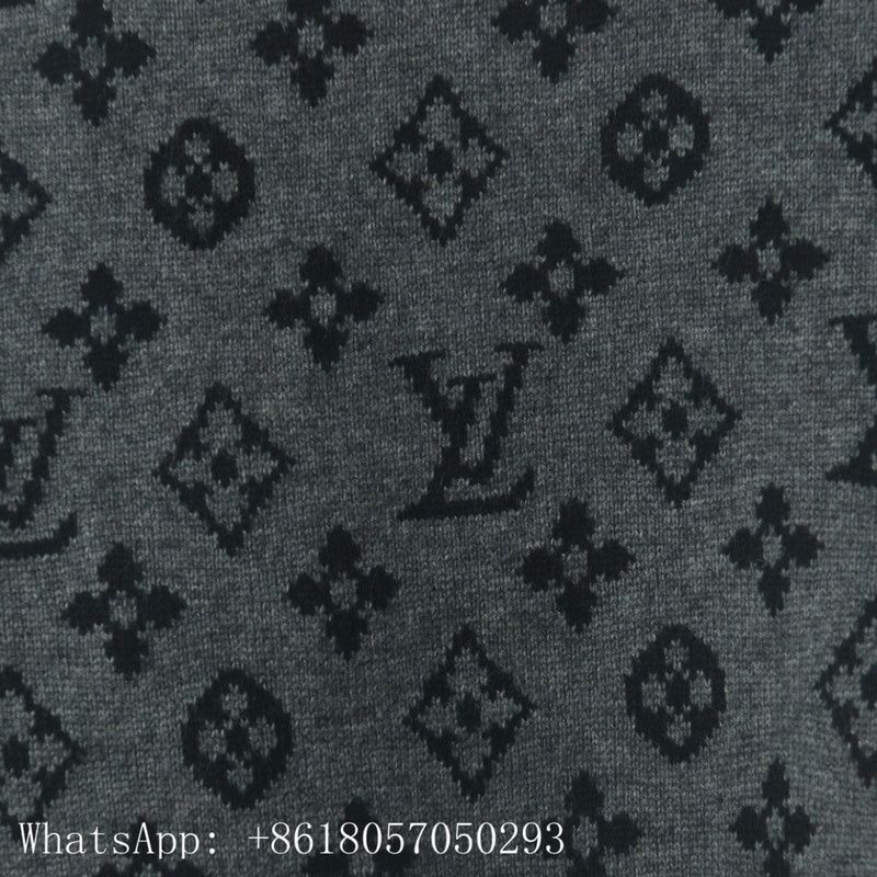 Flat lay presentation of Louis Vuitton luxury clothing with runway-inspired design