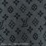 Flat lay presentation of Louis Vuitton luxury clothing with runway-inspired design