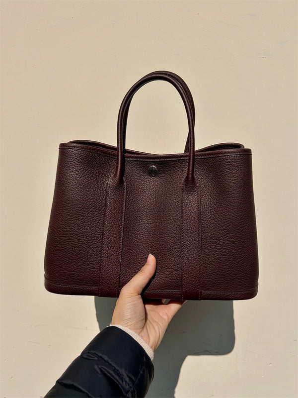  polished shoulder bag detail view showing craftsmanship 8