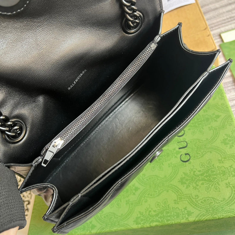 Side view of clean-lined structured handbag