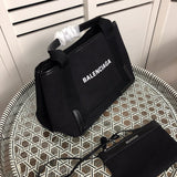 Handle and strap detail of elevated statement women's handbag – women's luxury handbag