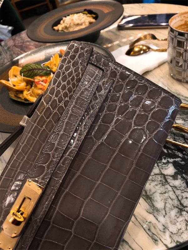 Side view of poised structured handbag