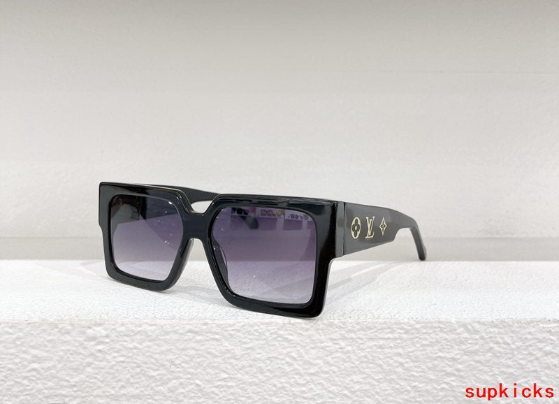 Close-up detail view of Louis Vuitton unisex sunglasses