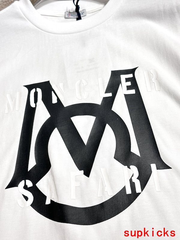 Close-up detail shot of Moncler luxury clothing with monogram-inspired silhouette