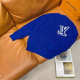 Close-up detail shot of Louis Vuitton luxury clothing with monogram-inspired silhouette